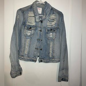 Ripped denim jacket. Size large